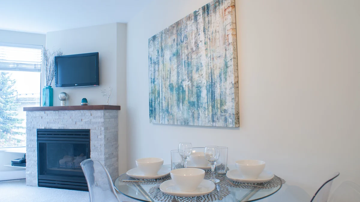 Living and dining area with fireplace