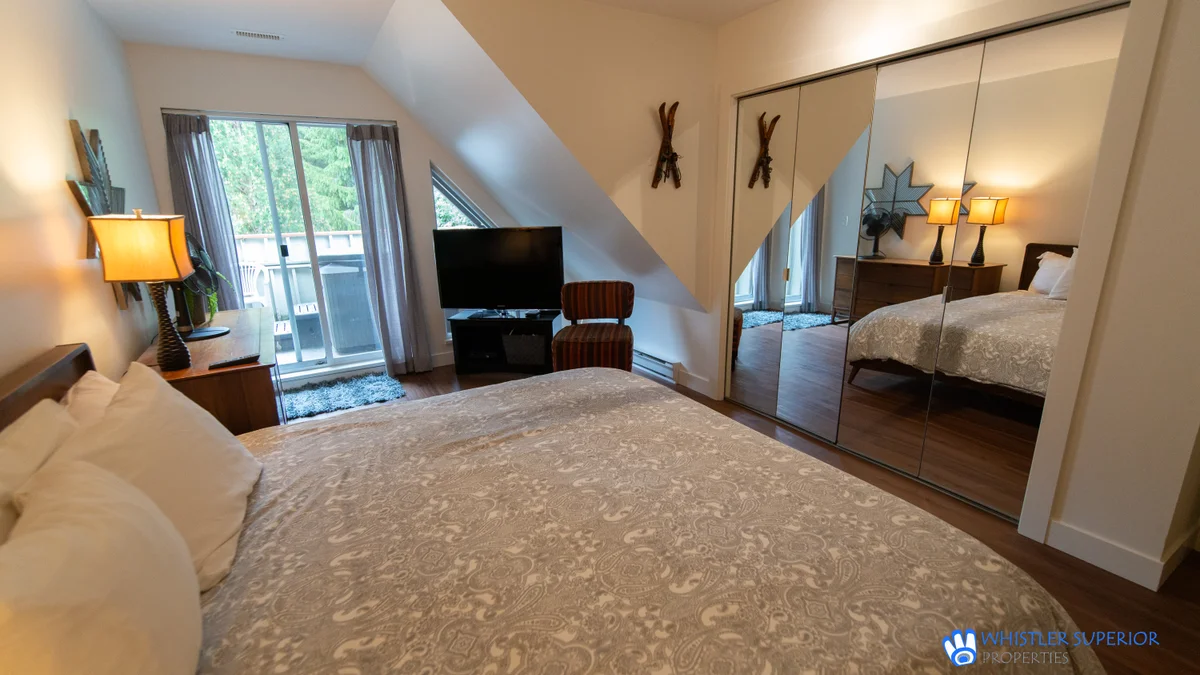 Master bedroom and access to hot tub