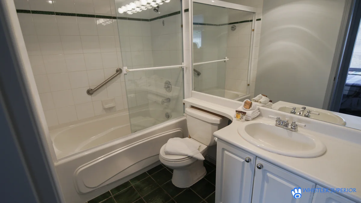 Washroom with shower-tub combo